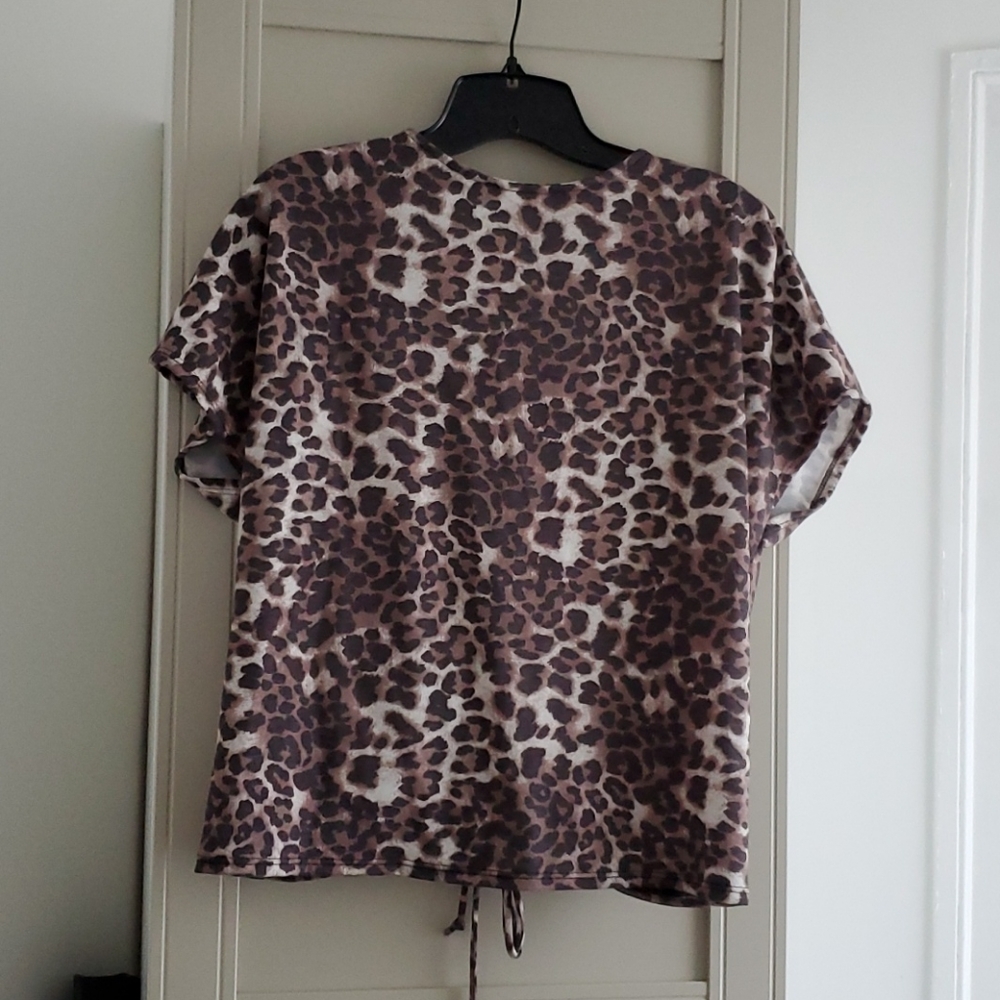 Alicia dimichele open back leopard top
